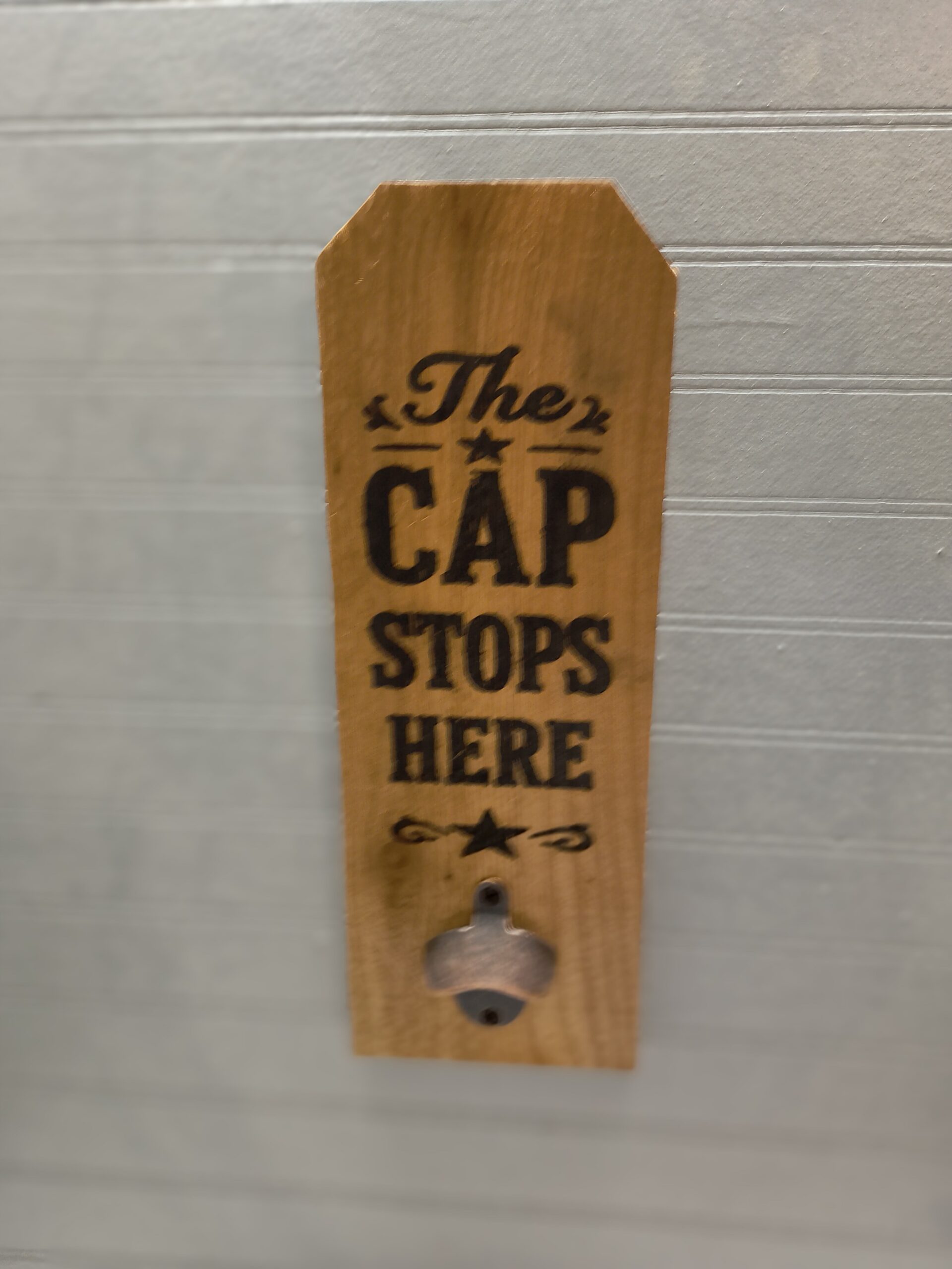 The Cap Stops Here wooden bottle opener eighteen dollar version